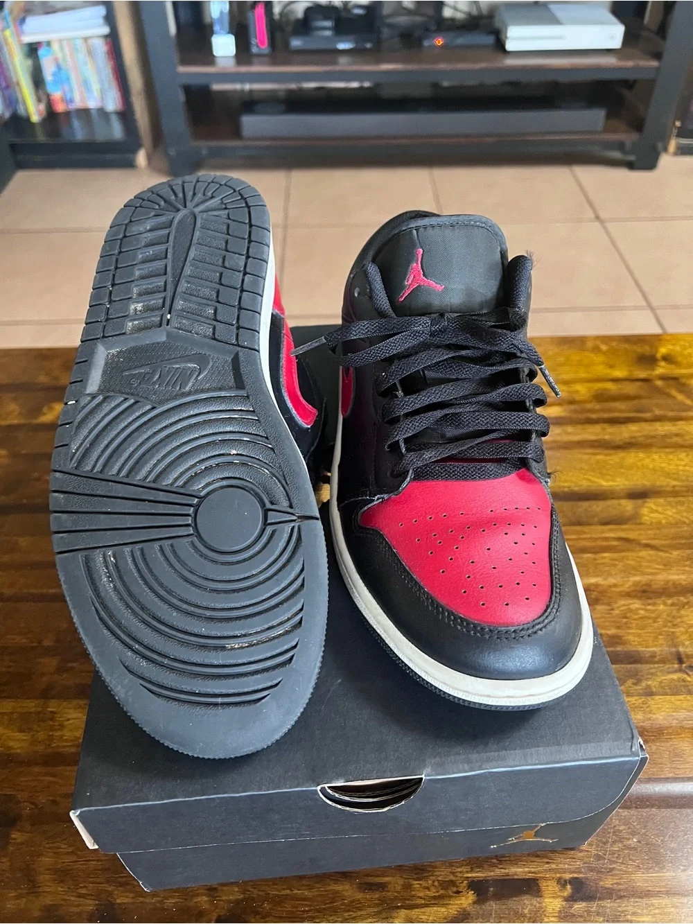Jordan 1’s High top Sneakers in Black and Red